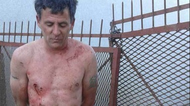 Insólito: Un policía entró a robar a una casa y quedó enganchado en una reja